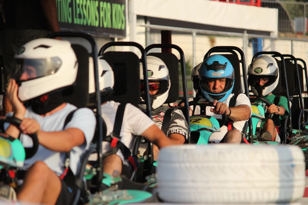 drivers patiently waiting to enter the go kart track pistapark